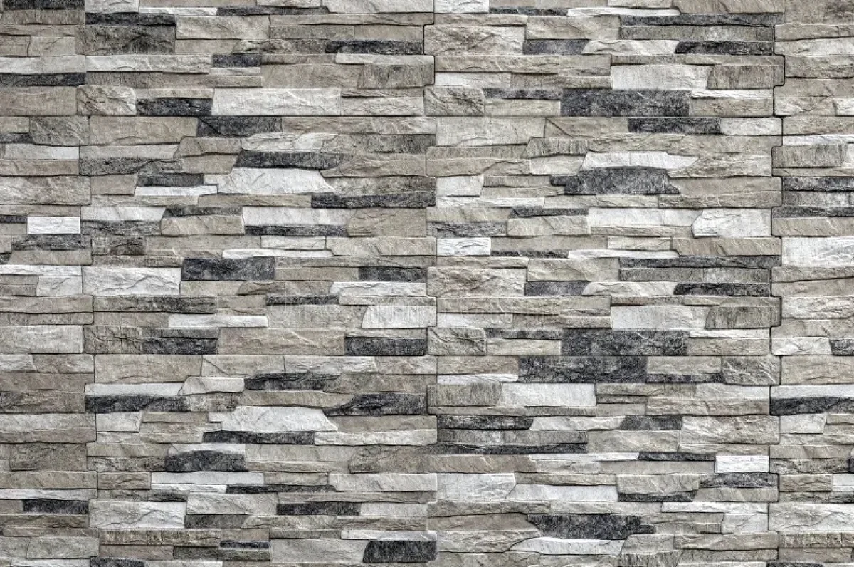 Revestimiento de piedra decorativa en piezas rectangulares grises y beige