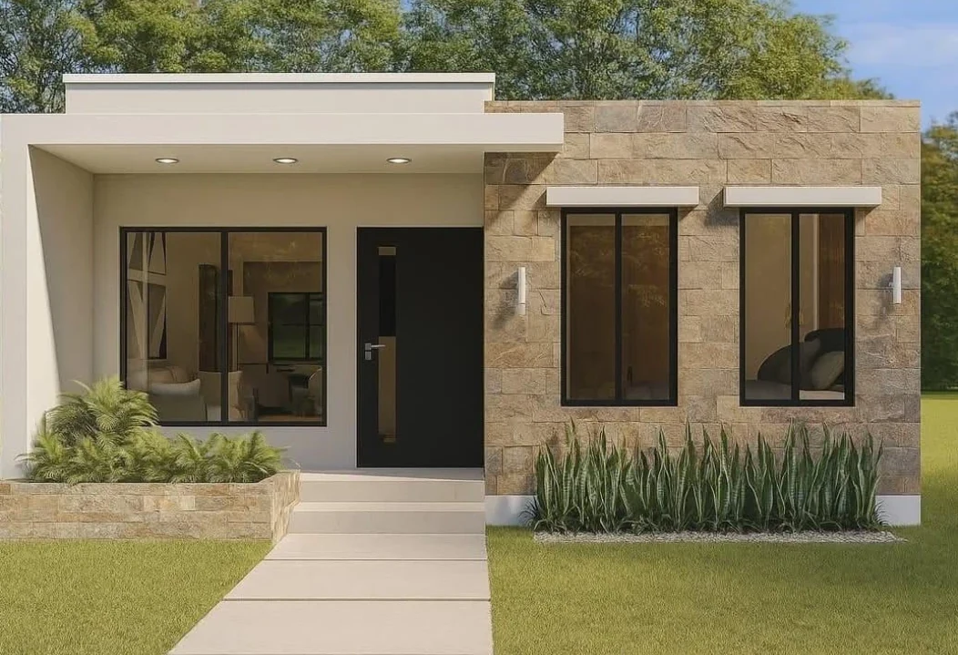 Modelo Hanna: fachada con muro de piedra y ventanales